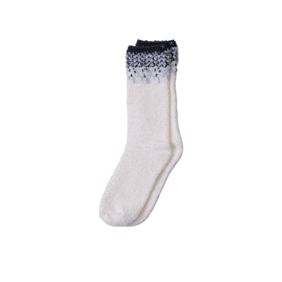 White sock with black gradient toe and heel on a light gray background