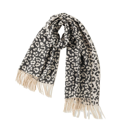 Leopard print scarf with fringes on a white background