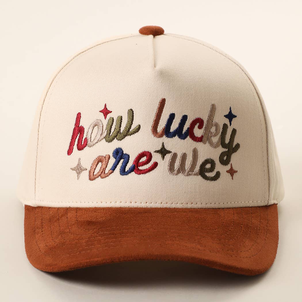 How Lucky Are We Embroidered Two-Tone Suede Brim Trucker Hat How Lucky Are We Embroidered Two-Tone Trucker Hat CINAMON Hats